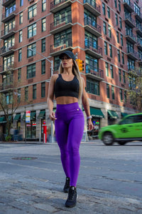 purple high-waisted leggings with wide waistband
